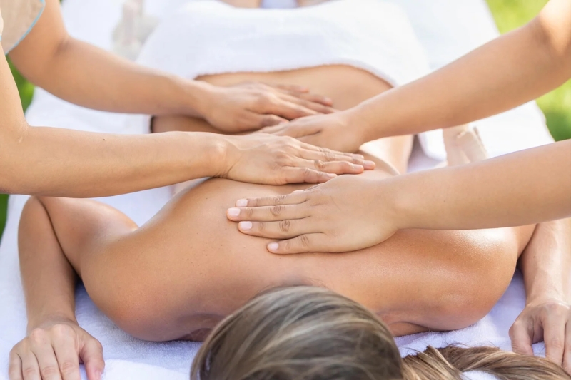 Luxurious four-hand massage with two therapists.